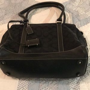 Coach hand bag in fabric with leather sm scratch